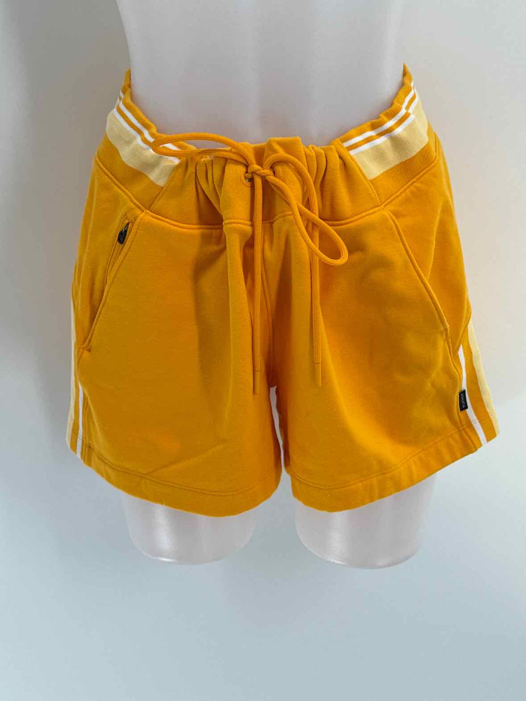 Size L Athleta Mustard Shorts