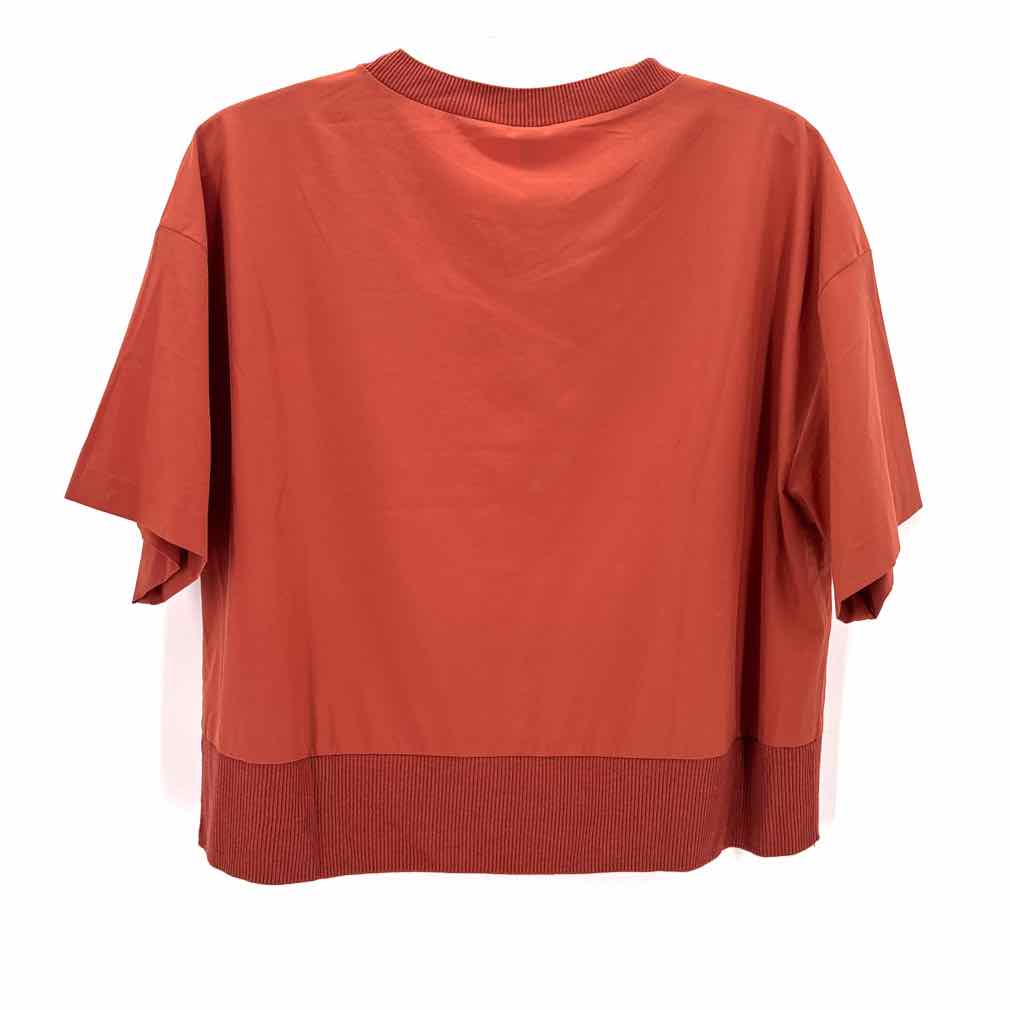 Size M Athleta Pumpkin Nylon Shirt