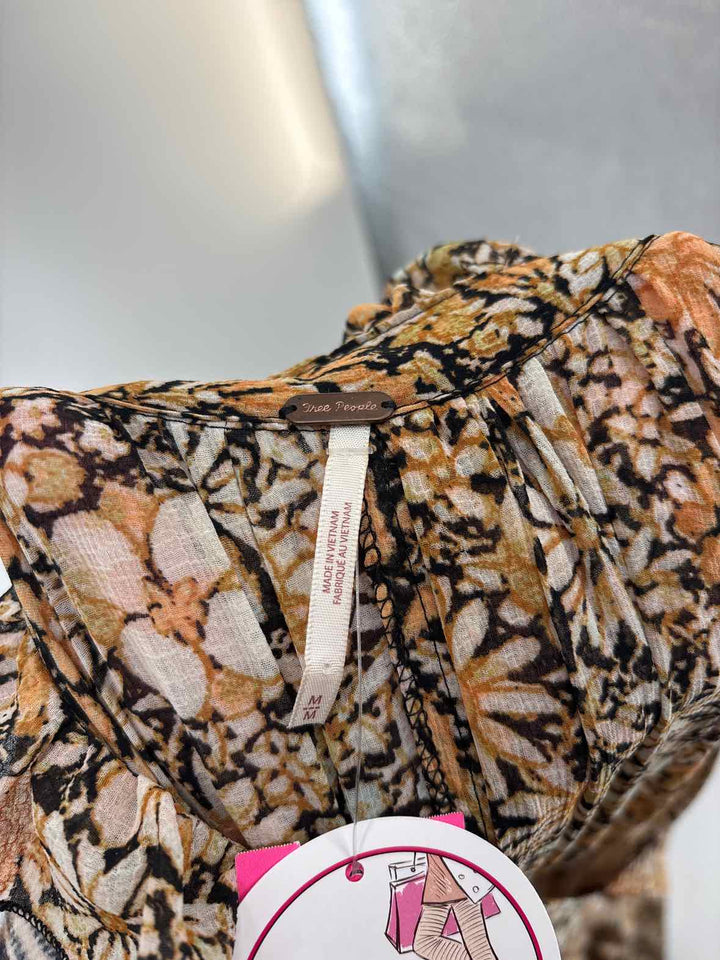 Size M FREE PEOPLE ORANGE PRINT Dress