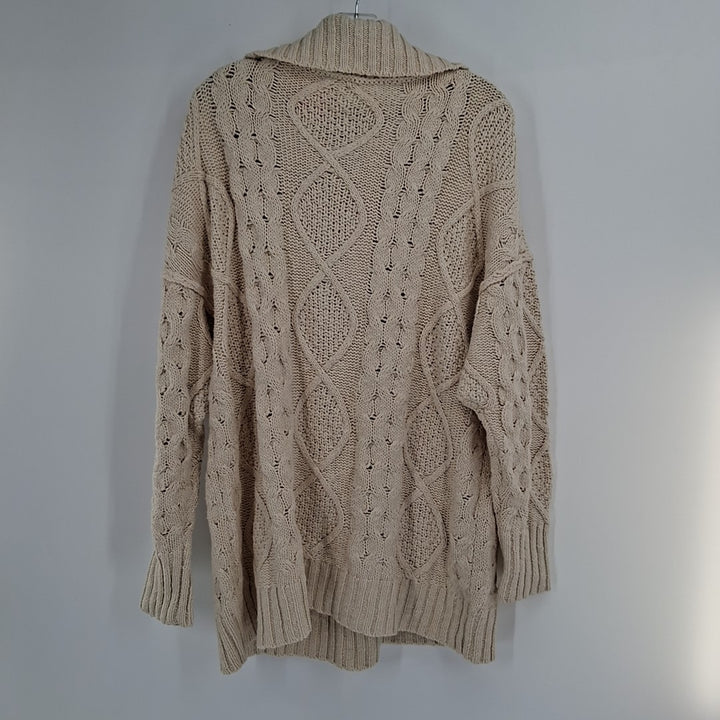 Size L FREE PEOPLE Ivory Knit Sweater